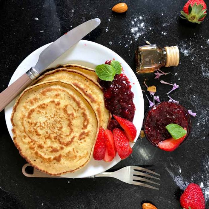 Poêle crêpe en fonte Pg hêtre + Spatule inox coudée