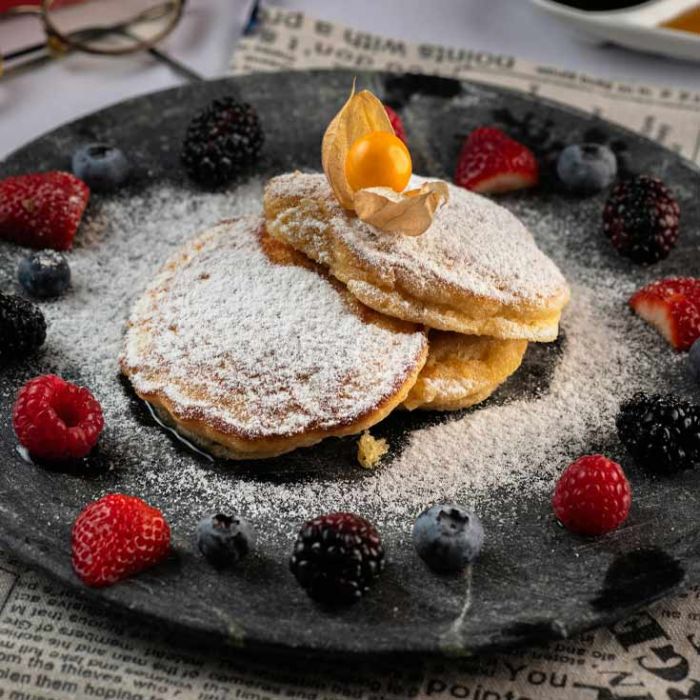 Crepiere poignée hêtre avec râteau à crêpe
