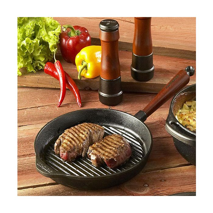 Cuisson viande sur poêle grill en fonte
