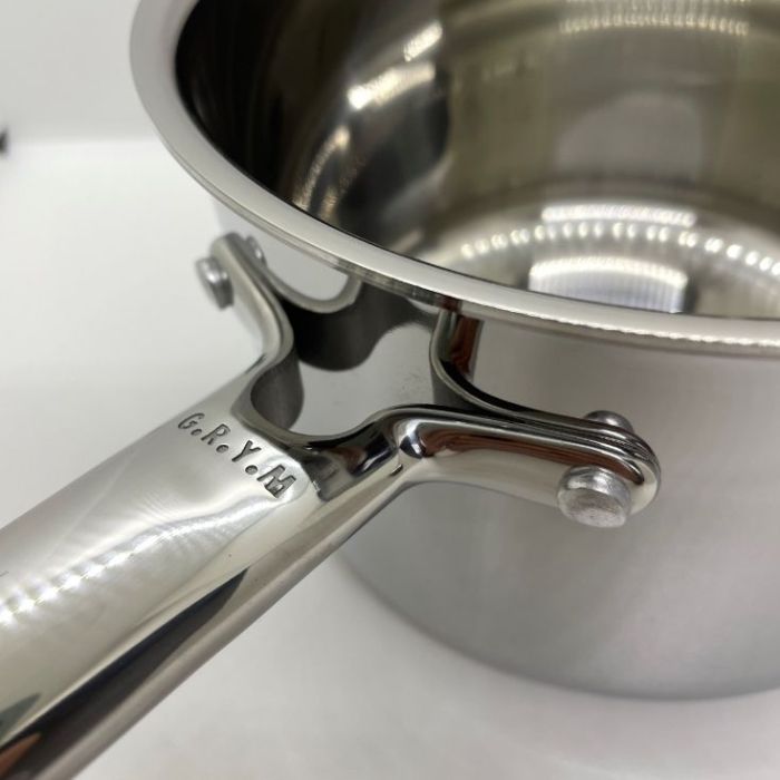 Fixation poignée inox rivetée