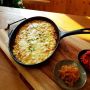 Gratin de pates dans poêle en fonte