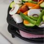 Cuisson viande légumes sur trepied