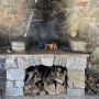 Cuisson sur braise plaque fonte sur pieds